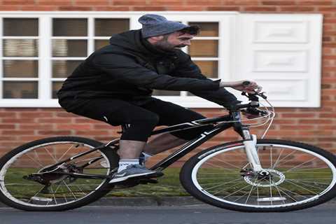 Man Utd Premier League winner looks unrecognisable 15 years on as he rides bike after driving ban