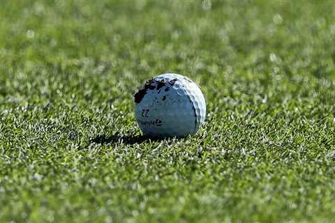 Rules Guy: Can you clean your ball if it picks up debris from ground under repair?