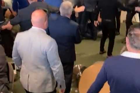 Huge fight breaks out at Sandown races as one man KOs another with sucker punch & cops..