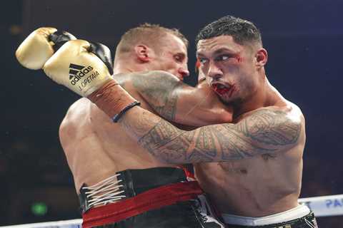 Boxer Jai Opetaia BREAKS his jaw in second round but carries on to win cruiserweight title on..