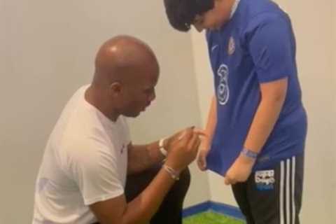 Watch hilarious moment young fan gets Chelsea shirt signed by Didier Drogba before whipping it off..