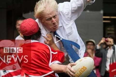 Boris Johnson takes out boy in rugby - BBC News