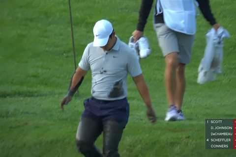 Golf fans in hysterics as Tom Kim falls in mud before going topless after wayward shot into creek..