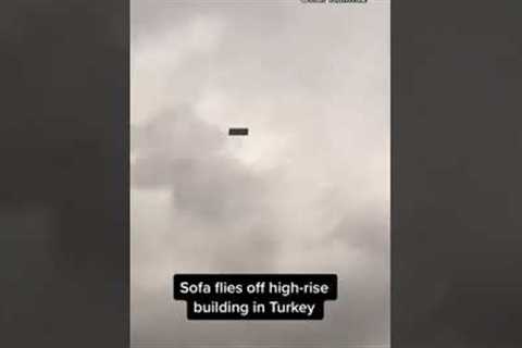 Sofa flies off a high-rise building in Ankara, Turkey, following strong winds and rain #shorts